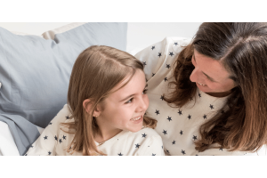 Mother and daughter wearing Zizzz pajamas