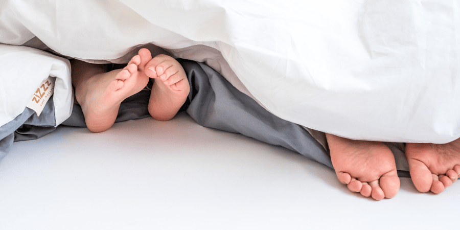 sleeping barefoot under the duvet