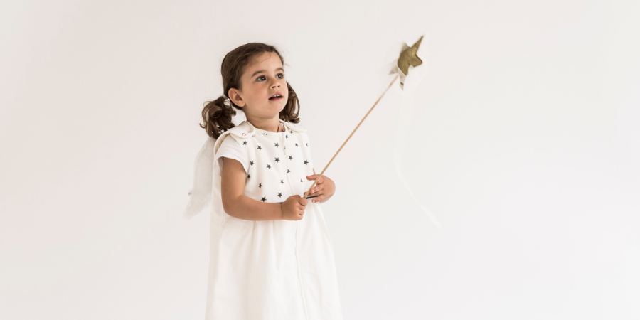Child holding a magic wand
