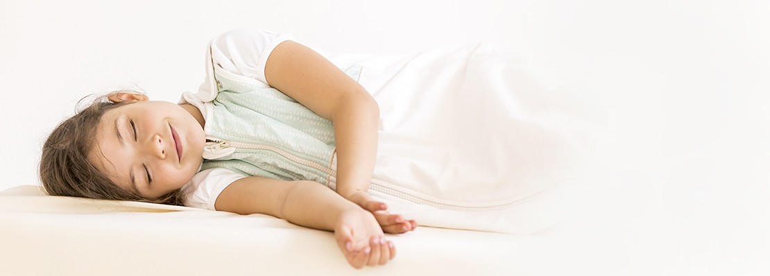 Sleeping Child with a Zizzz Baby Sleeping Bag